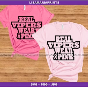 May include: Two pink t-shirts with the text "Real Vipers Wear Pink" and a pink ribbon graphic. The text is in black and bold.