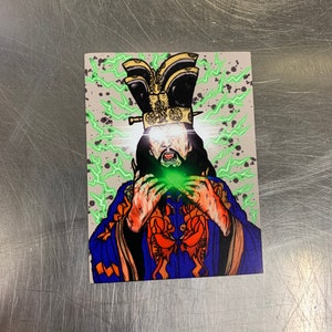 May include: A digital illustration of a character with a crown of boots, a green glowing orb in their hands, and a green and white background.