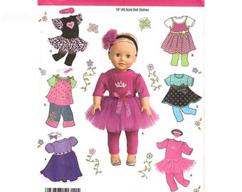 May include: Simplicity pattern 1711 for 18-inch doll clothes. The package features a doll wearing a magenta dress with a tulle skirt, a crown graphic, and a matching headband. Illustrations show various dress, top, and legging combinations.
