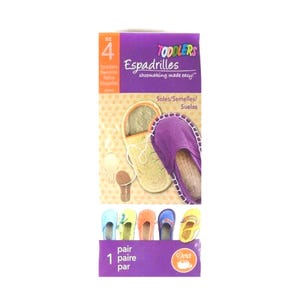 May include: A package of toddler espadrilles in size 4. The purple and yellow box features the words "TODDLERS Espadrilles shoemaking made easy!" and shows a pair of purple and beige espadrilles. The bottom of the box shows a variety of colorful espadrilles.