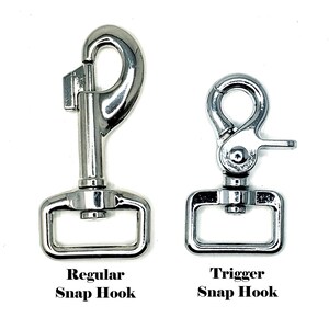 May include: Two silver snap hooks, one labeled "Regular Snap Hook" and the other labeled "Trigger Snap Hook".