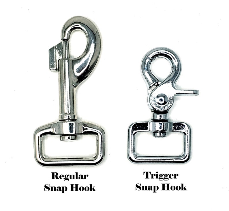 May include: Two silver snap hooks, one labeled "Regular Snap Hook" and the other labeled "Trigger Snap Hook".