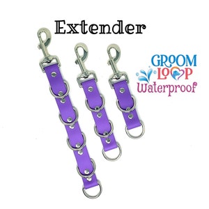 May include: Three purple extenders with silver metal rings and clips. The extenders are labeled "Groom Loop Waterproof".