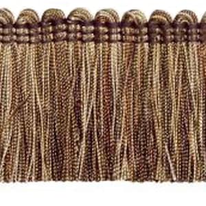 May include: Brown and gold fringe trim with a dark brown woven top. This trim is perfect for adding a touch of elegance to curtains, pillows, or other home decor projects.