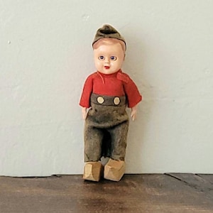 Vintage Dutch boy doll, very old hard plastic sleep eyes doll with wooden shoes and felt clothes, 4&quot; tall.