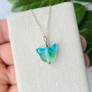 Tiny bluebird of happiness handmade lampwork glass bead necklace, 16&quot; sterling silver chain.