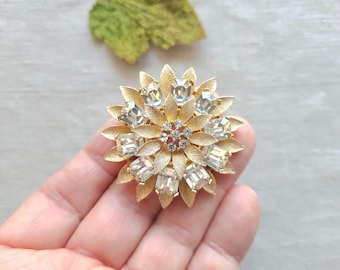 Lisner signed rhinestone flower brooch, brushed gold, clear stones, statement