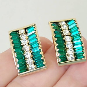 Vintage signed Weiss rhinstone clip on goldtone hoop earrings, green baguette and clear round.