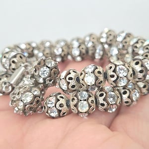 Retro vintage brass filigree clear rhinestone beaded bracelet, double strand, tab insert clasp, 7.5".