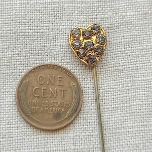 Heart shaped necktie or lapel stick pin, rhinestones, gilt gold, early to mid century, unisex.