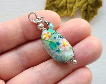 Handcrafted effetre murano millefiori lampwork glass bead pendant, fine silver bail, handmade.