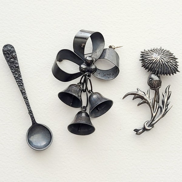 Antique and vintage Sterling silver brooches, priced individually, steiff repousse salt spoon, Mexico bow and bells, Lang thistle flower.