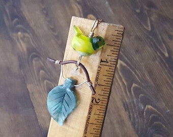 Glass bird bead on branch pendant OOAK handmade necklace green yellow Jadeite leaf