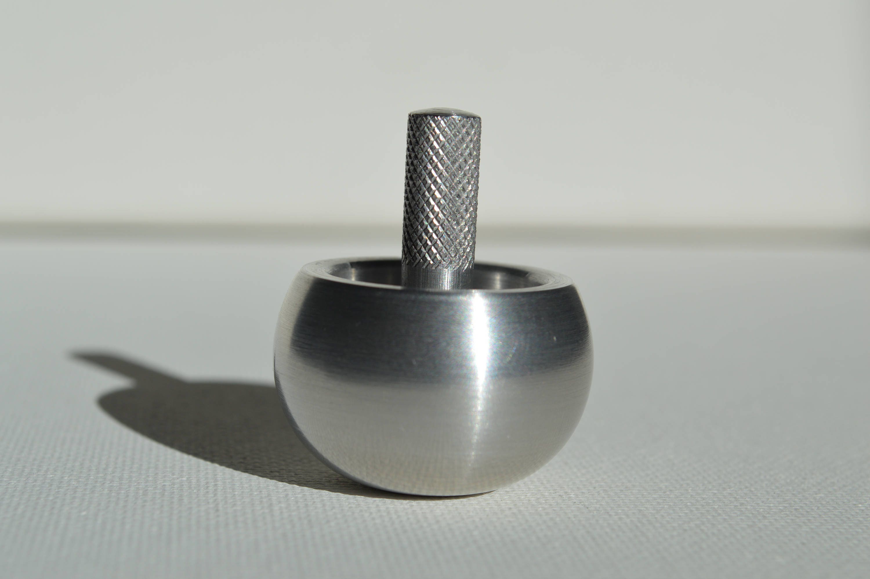 Machined spinning top sales