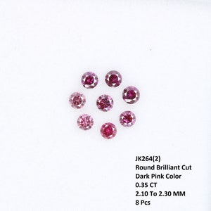 May include: Eight round brilliant cut dark pink diamonds, each measuring 2.10 to 2.30 mm and weighing 0.35 carats total. JK264(2)