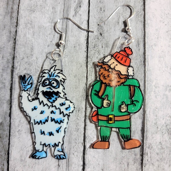 Christmas Earrings. Yukon Cornelius and the Bumble earrings. Rudolph earrings. Yeti earrings. The abominable snowman earrings. Shrinky dink.