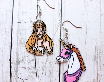 She Ra Princess of Power and Swift Wind earring set. Retro She Ra mismatched earrings. He man inspired earrings. Vintage cartoon earrings.