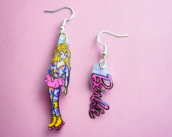 Barbie Earrings. 1980s roller skate Barbie mismatched earrings.