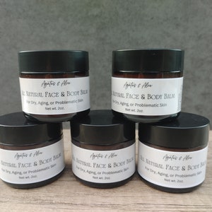 May include: Five small jars of all natural face and body balm, labeled "Agates & Aloe", for dry, aging, or problematic skin. Each jar is 2 ounces.