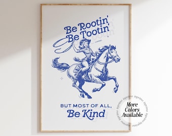 May include: A blue and white poster with a cowgirl riding a horse. The poster says "Be Rootin' Be Tootin'" and "But most of all, Be Kind".
