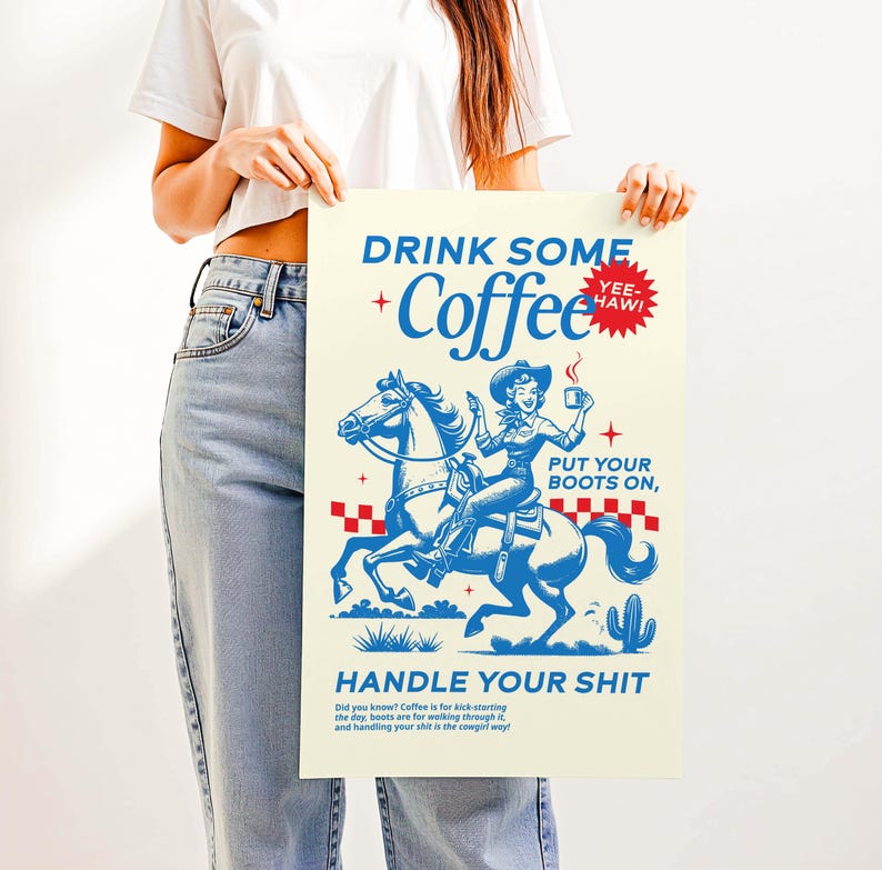 Cowgirl-inspired wall art print that says “Drink Some Coffee, Put Your Boots On, Handle Your Sh*t,” styled for a modern coffee bar or kitchen coffee station with a warm western vibe and motivational decor.