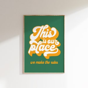 May include: A green poster with white text that reads "This is our place we make the rules" in a retro font. The text is outlined in yellow.