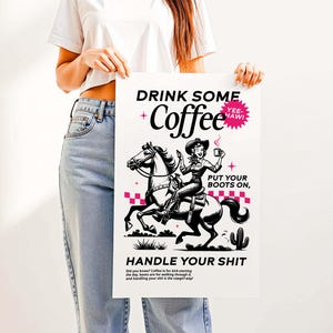 Cowgirl-inspired wall art print that says “Drink Some Coffee, Put Your Boots On, Handle Your Sh*t,” styled for a modern coffee bar or kitchen coffee station with a warm western vibe and motivational decor.