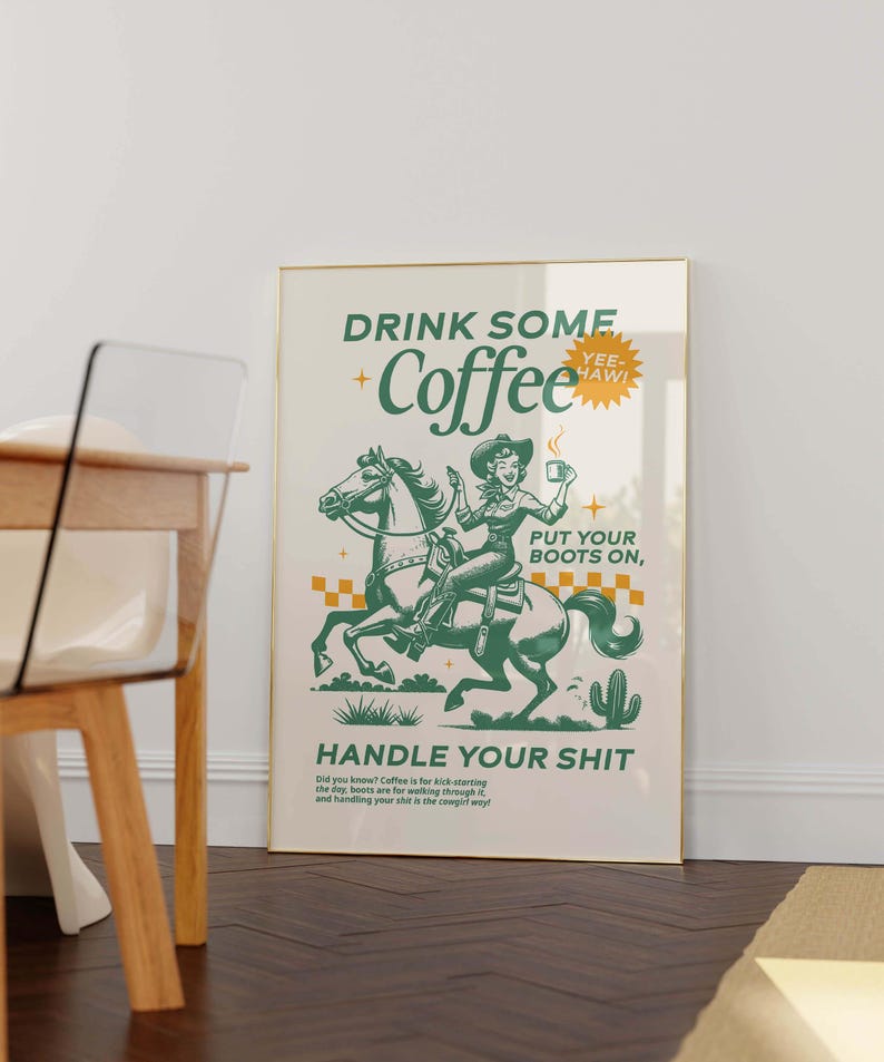 Cowgirl-inspired wall art print that says “Drink Some Coffee, Put Your Boots On, Handle Your Sh*t,” styled for a modern coffee bar or kitchen coffee station with a warm western vibe and motivational decor.