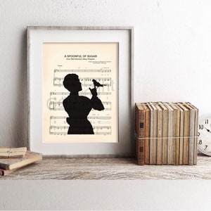 Impressão artística de partituras de Mary Poppins e silhueta de pássaro com colher de açúcar