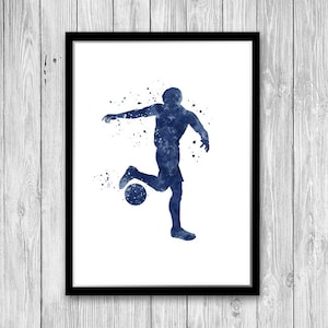 May include: A watercolor painting of a soccer player in blue, kicking a ball. The player is silhouetted against a white background with blue watercolor splatters.
