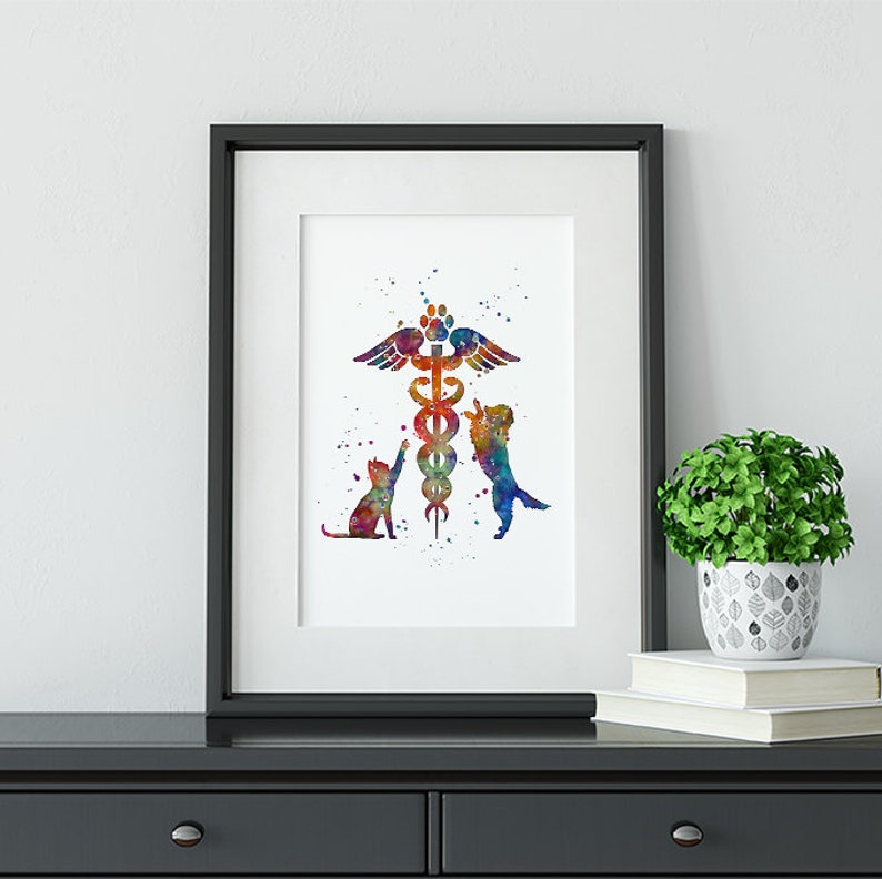 May include: A watercolor painting of a veterinary symbol with a cat and dog on either side. The symbol is a caduceus with a snake wrapped around it and wings on top. The cat and dog are both looking up at the symbol. The background is white with a few watercolor splatters.