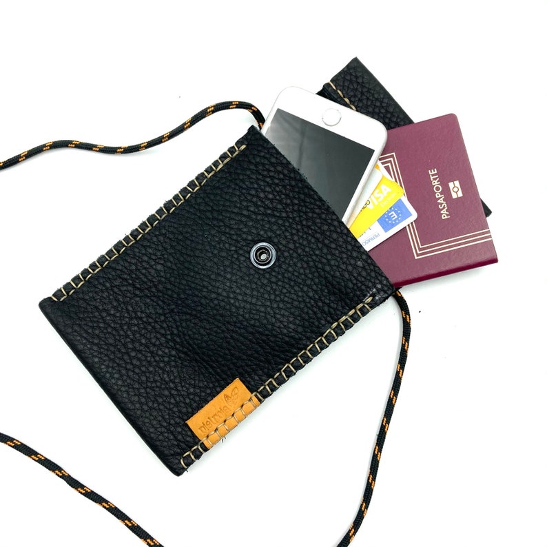 Black leather travel neck wallet.