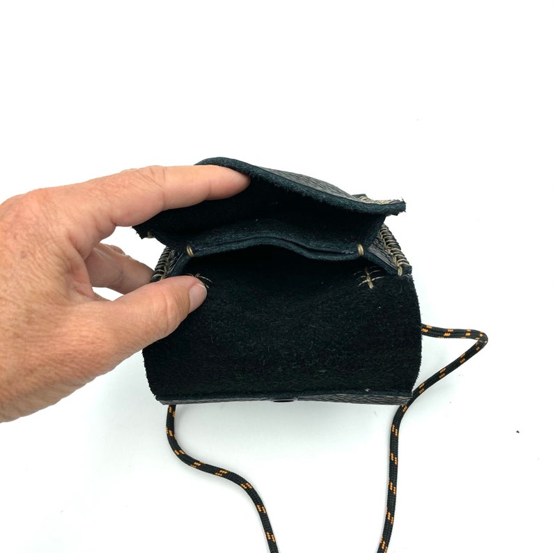 Black leather travel neck wallet.