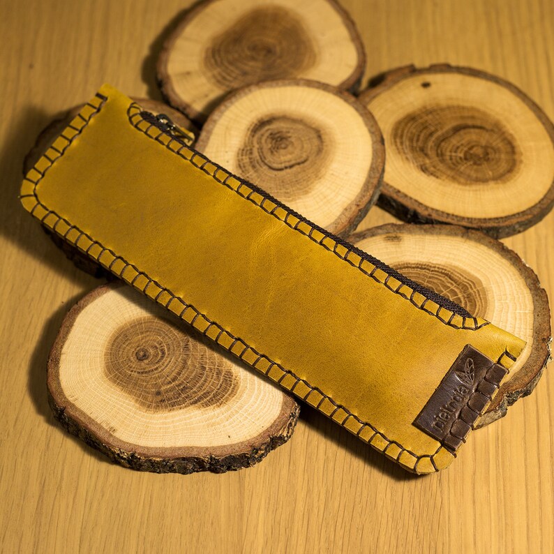 Minimalist old gold leather case