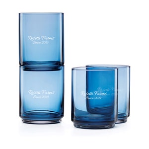 May include: Four blue glass tumblers with the text "Rosetti Farms Since 2019" etched on the side.