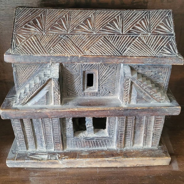 Decorative wooden box with typical nepali house shape. Secret Boxes inside ,Handmade in Nepal.