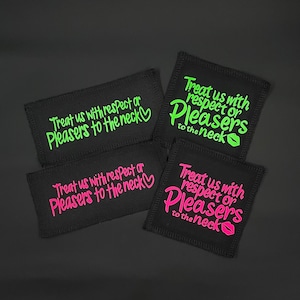 May include: Four black fabric squares with pink and green text. The text reads "Treat us with respect or Pleasers to the neck". Each square has a pink heart or a pink lip graphic.