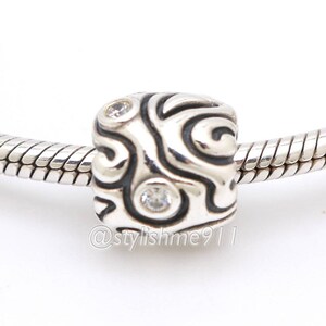 Authentic PANDORA Sparkling Frills Daydream Charm - 790548CZ