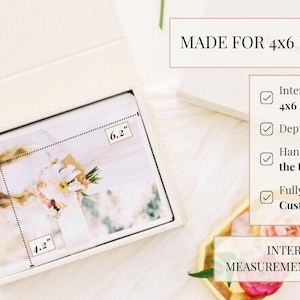 May include: A cream-colored photo storage box with an open lid, containing a photograph. Text on the box reads: MADE FOR 4x6 PHOTOS, Internal Size: 4x6 Inches, Depth: 1.4, Handmade in the US, Fully Customizable, and INTERNAL MEASUREMENTS SHOWN.