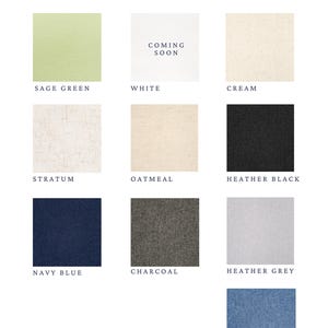 May include: A colour chart titled FABRIC COLORS OPTIONS displaying ten square swatches. Colours include sage green, white with text COMING SOON, cream, stratum, oatmeal, heather black, navy blue, charcoal, heather grey, and french blue fabric textures.