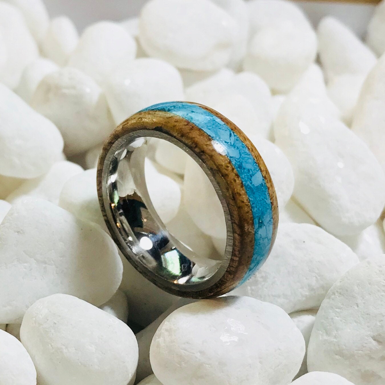 Hawaiian Koa wood ring with a turquoise inlay and a stainless steel core