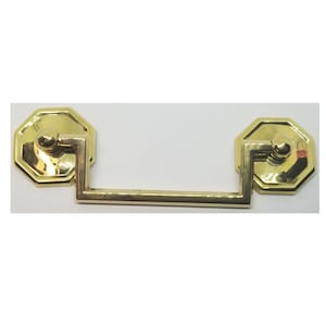 May include: Gold-toned cabinet pull with an octagonal design and a rectangular bar handle.