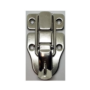 May include: A shiny, silver-colored metal latch with a curved design. The latch has a hinged closure and includes mounting holes for secure attachment. This hardware component is suitable for boxes, chests, or other small containers.