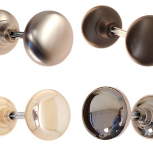 May include: Four different door knobs in various finishes, including polished nickel, oil rubbed bronze, polished brass, and chrome.