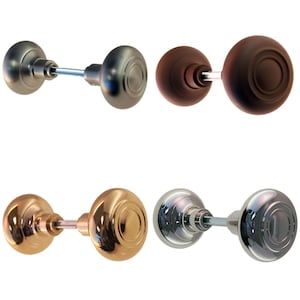 May include: Four pairs of door knobs in different finishes: satin nickel, oil rubbed bronze, polished brass, and polished chrome.