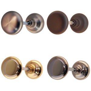 May include: Four pairs of door knobs in different finishes: brushed nickel, oil rubbed bronze, polished brass, and satin nickel.