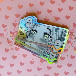 May include: Three iridescent holographic stickers with a manga-style illustration of a woman with hearts in her eyes. The text on the stickers reads "We should... be lovers." and "TheVividOwl.Etsy.com".