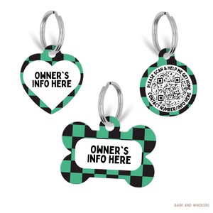 May include: Three pet ID tags with a black and teal checkered pattern and silver split rings. One heart-shaped tag and one bone-shaped tag both read OWNER'S INFO HERE. One circular tag features a QR code and text PLEASE SCAN & HELP ME GET HOME.