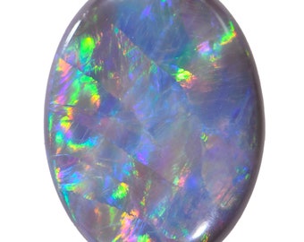 May include: A dark gray opal gemstone with iridescent blue, green, and purple flashes. The oval-shaped stone is polished and has a smooth surface.