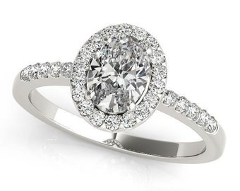 1/4 ct tw Oval Cut Diamond Engagement Ring F VS GIA Center